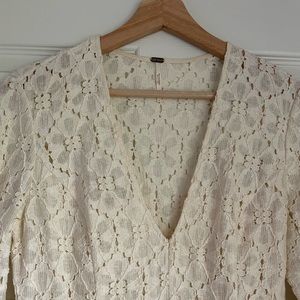 Free People Lace Dress with bell sleeves and raw edge hem. Size 2.